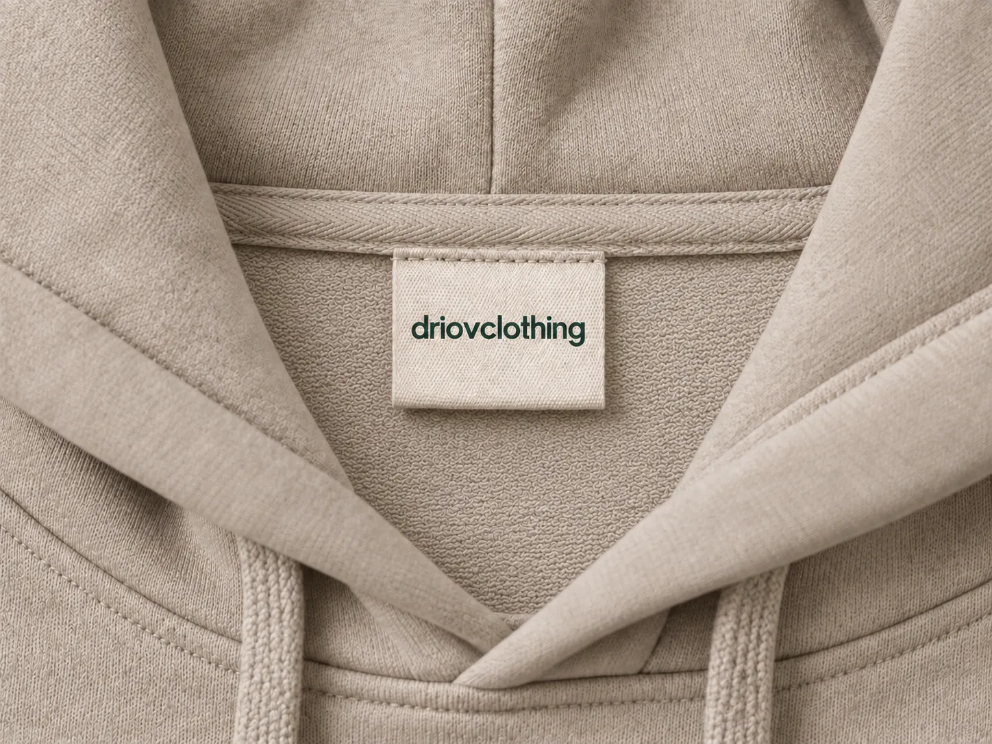 A driovclothing neck label inside the stone pullover hoodie