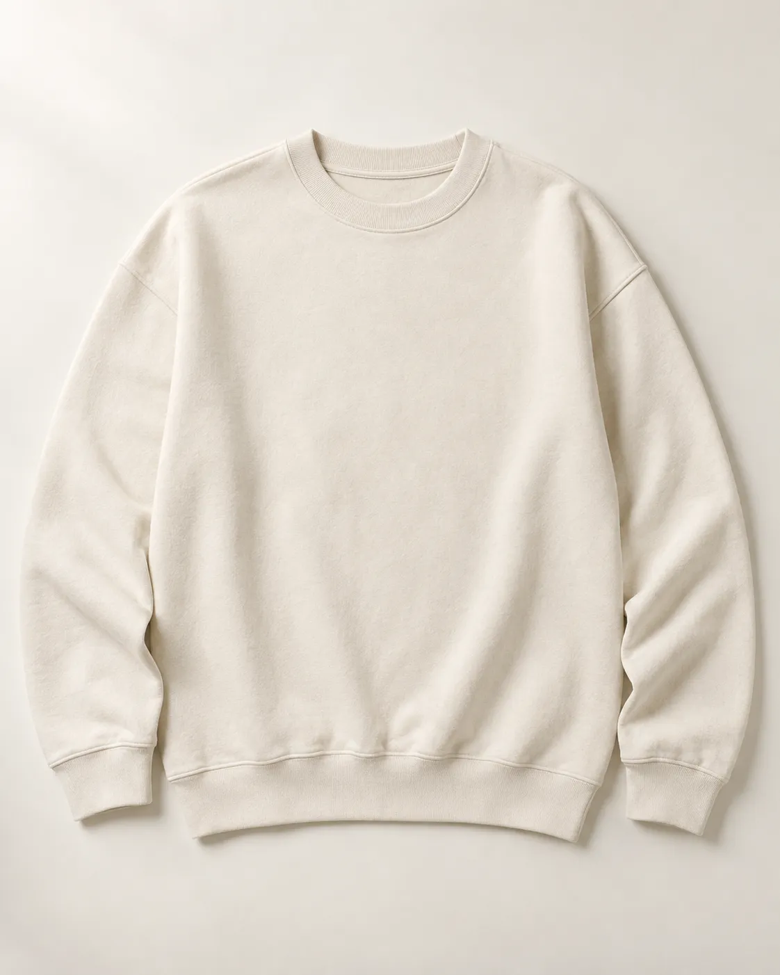 Front view of an ecru crewneck sweatshirt with ribbed cuffs and hem, illustrating the sweatshirt category.