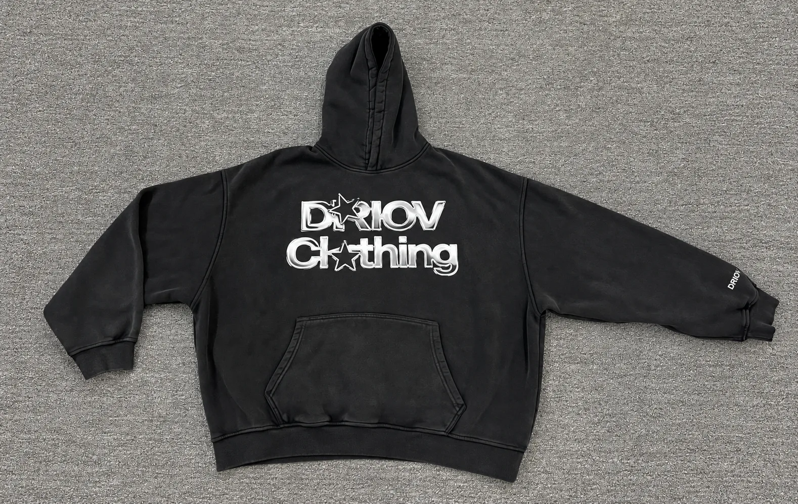 Black pullover hoodie with a white DRIOV Clothing graphic across the chest.