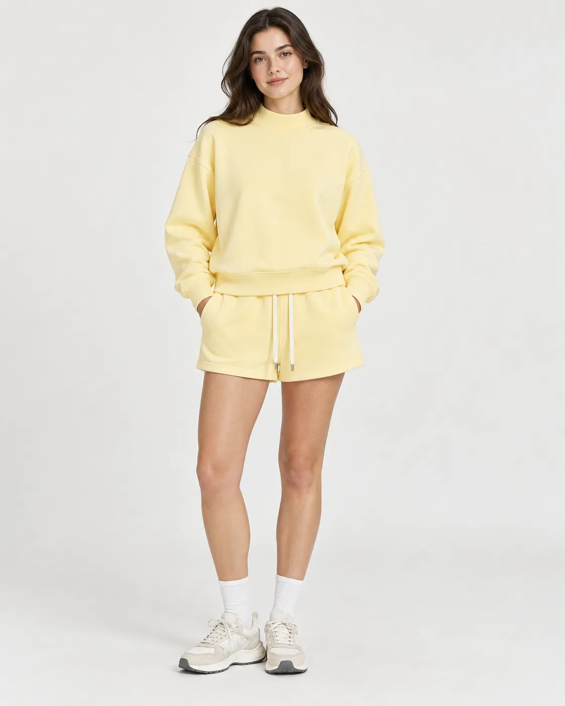 Rise 350 Mock-Neck in Cream Apricot, female model · matching set